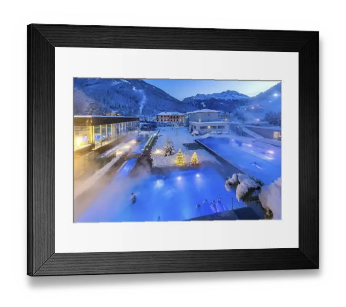 Framed Print : Snow-covered rock spa in winter