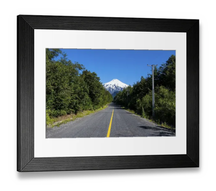 Framed Print : Road leading to the snowcapped volcano Villarrica