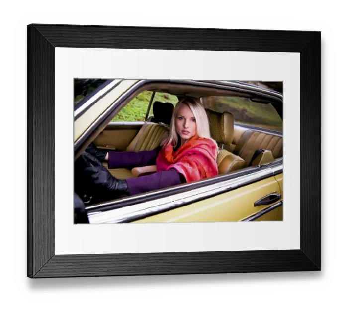Framed Print : Young woman in a vintage Mercedes Benz