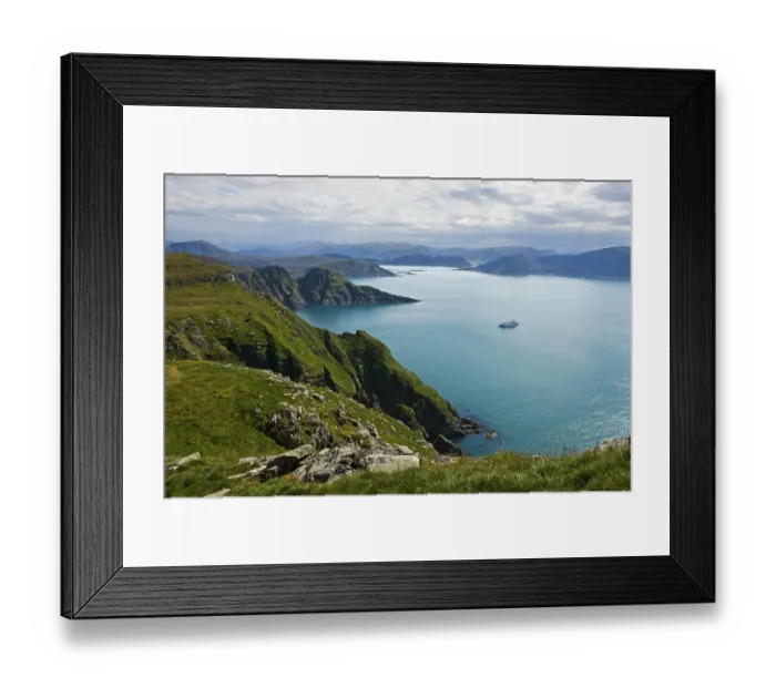 Framed Print : Cruise ship in a bay off the rugged cliffs of Runde island
