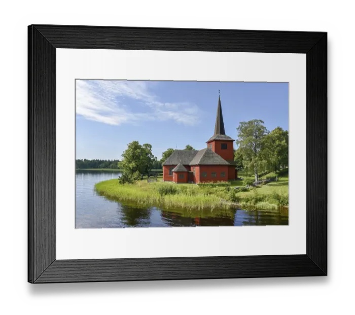 Framed Print : Lungsunds kyrka, church by a lake in Storfors