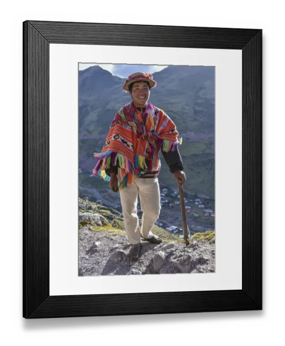 Framed Print : Indio mountain guide with hat and poncho in the Andes