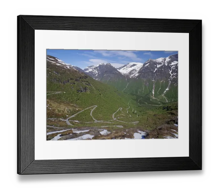 Framed Print : Mountain pass in Zig Zag, spring-like landscape with snowfields Framed Print : Mountain pass in Zig Zag, spring-like landscape with snowfields