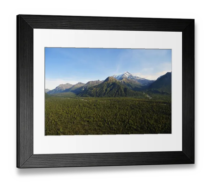 Framed Print : Wide forested valley with mountain peaks Framed Print : Wide forested valley with mountain peaks