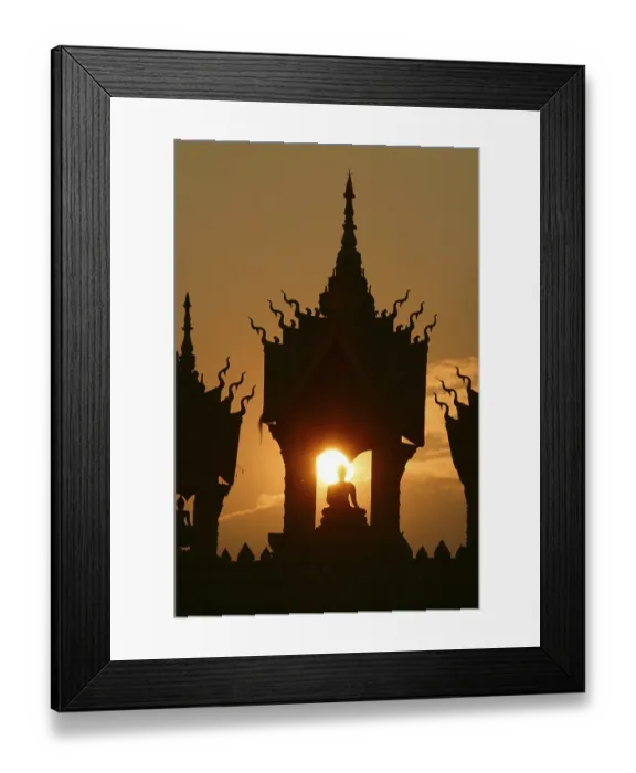 Framed Print : Sunset behind a Buddha statue at That Luang Vientiane Framed Print : Sunset behind a Buddha statue at That Luang Vientiane