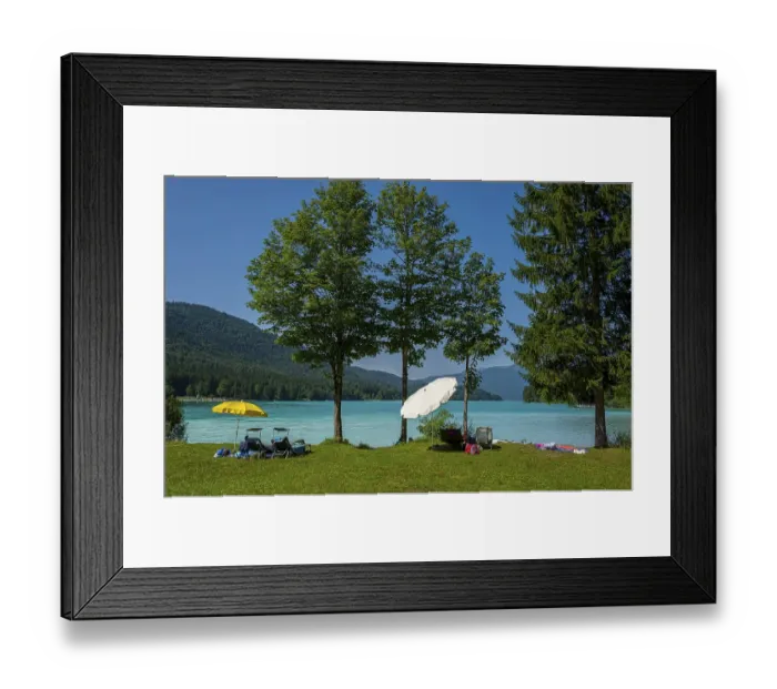 Framed Print : Bathing area with parasols on the shore of Lake Walchensee