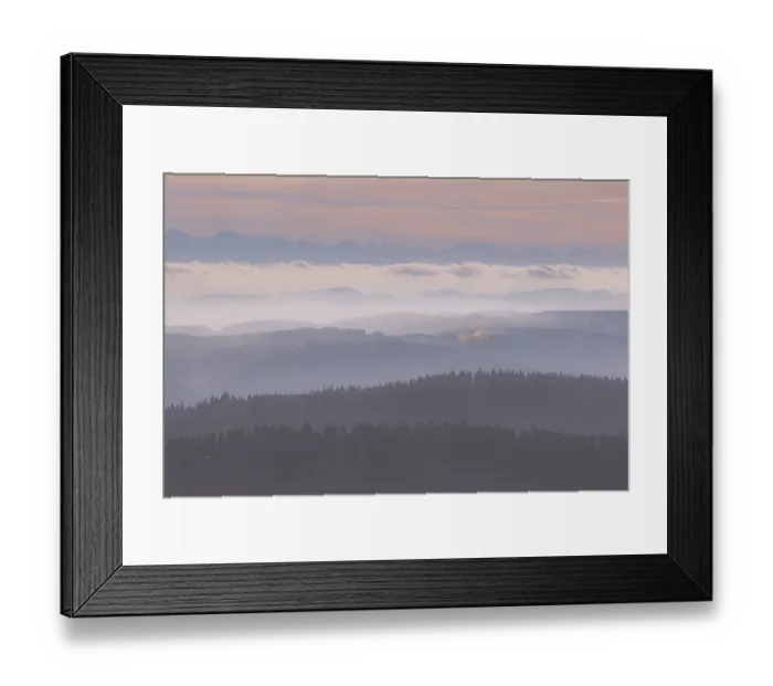 Framed Print : Soft colours over mist-covered mountain ranges at dusk Framed Print : Soft colours over mist-covered mountain ranges at dusk