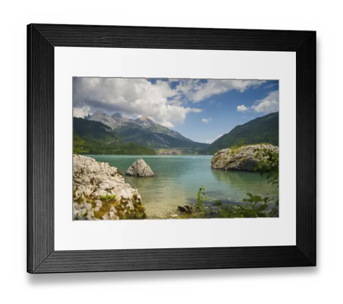Framed Print : Lake Molveno is nestled between mountains in the Dolomites Framed Print : Lake Molveno is nestled between mountains in the Dolomites