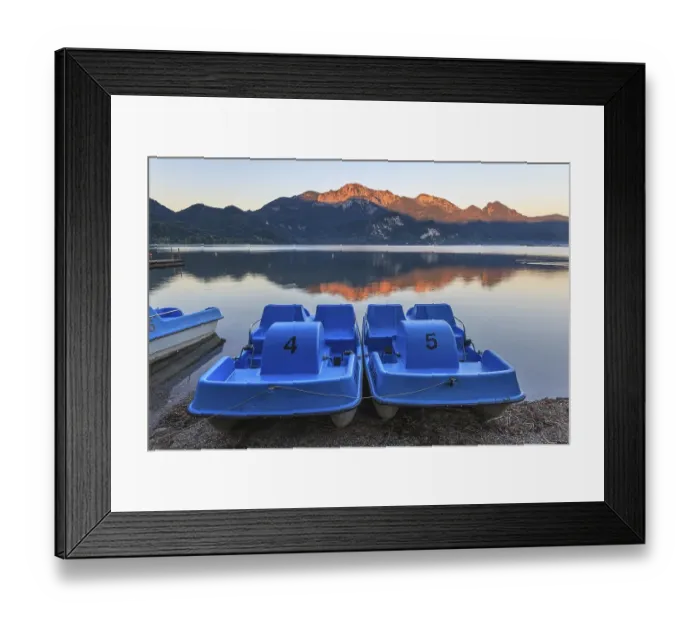 Framed Print : Mountains reflected in lake, pedal boats