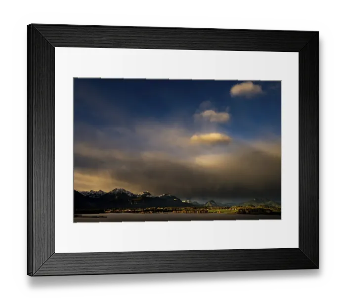 Framed Print : Lake Hopfensee with stormy sky in soft morning light and Allgaeu mountains in the background