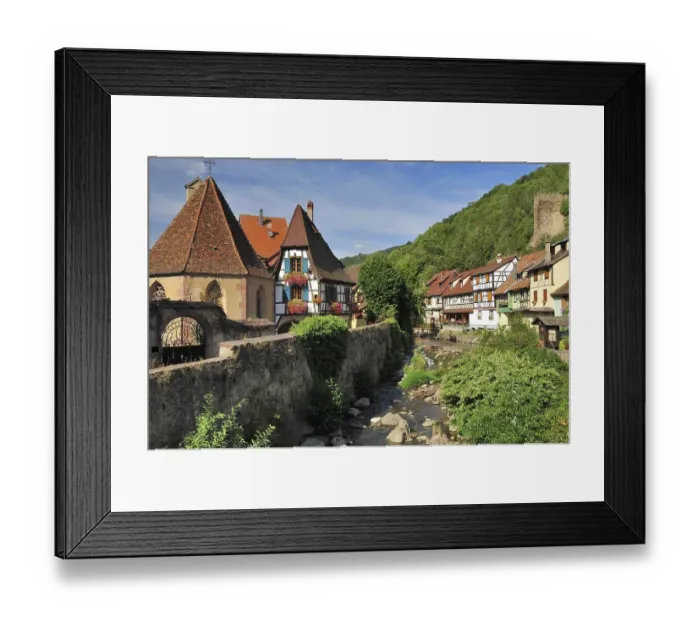 Framed Print : Half-timbered houses on the Weiss river in the town of Kaysersberg