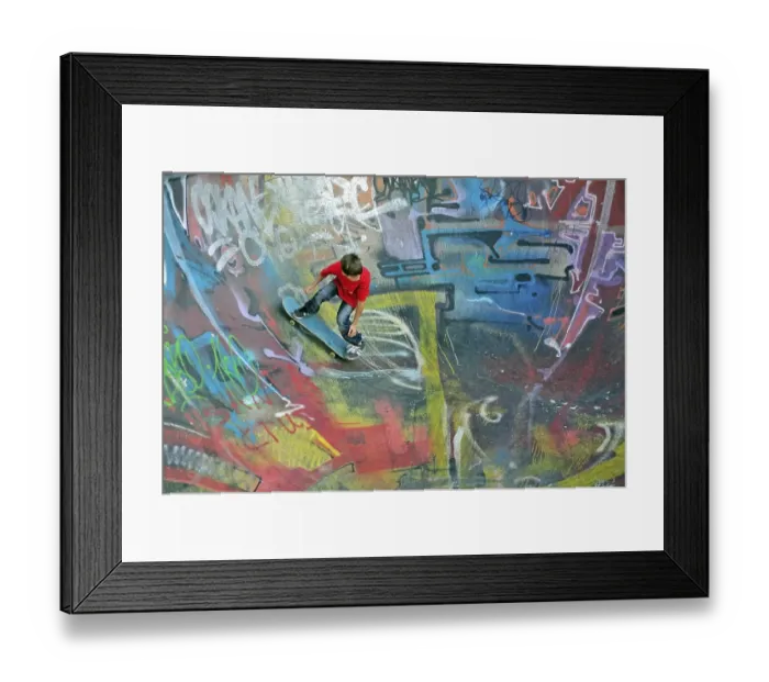 Framed Print : Skateboarder, 10 years, bowl of a skateboarding ramp Framed Print : Skateboarder, 10 years, bowl of a skateboarding ramp