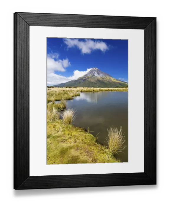 Framed Print : Mountain lake with the Mount Taranaki volcano