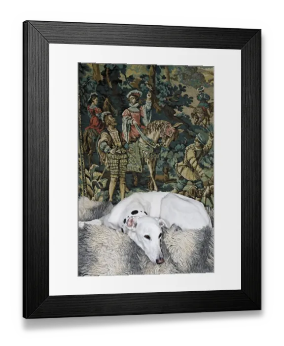 Framed Print : Greyhound lying in front of a tapestry showing a medieval hunting scene