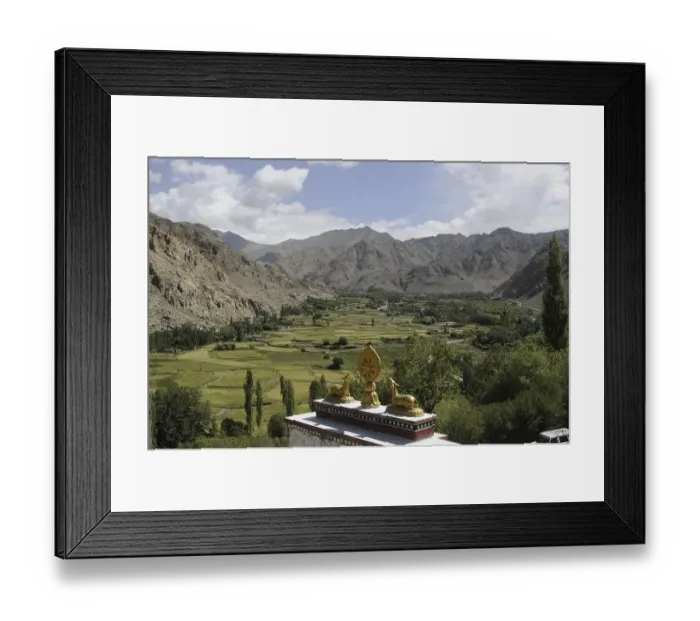 Framed Print : Oasis and Phiyang Monastery with Buddhist symbols on the monastery Framed Print : Oasis and Phiyang Monastery with Buddhist symbols on the monastery