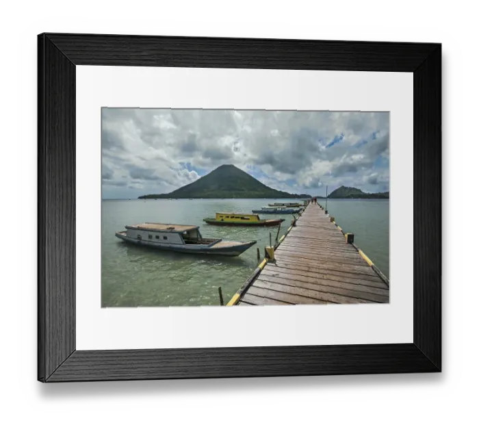 Framed Print : Jetty of Lonthor, the volcano Gunung Api behind