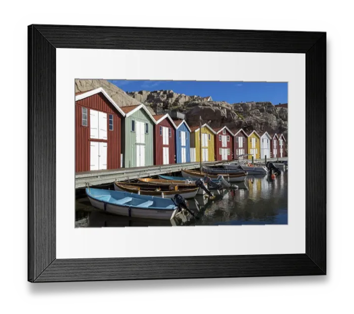 Framed Print : Fishing boats and colourful boathouses Framed Print : Fishing boats and colourful boathouses