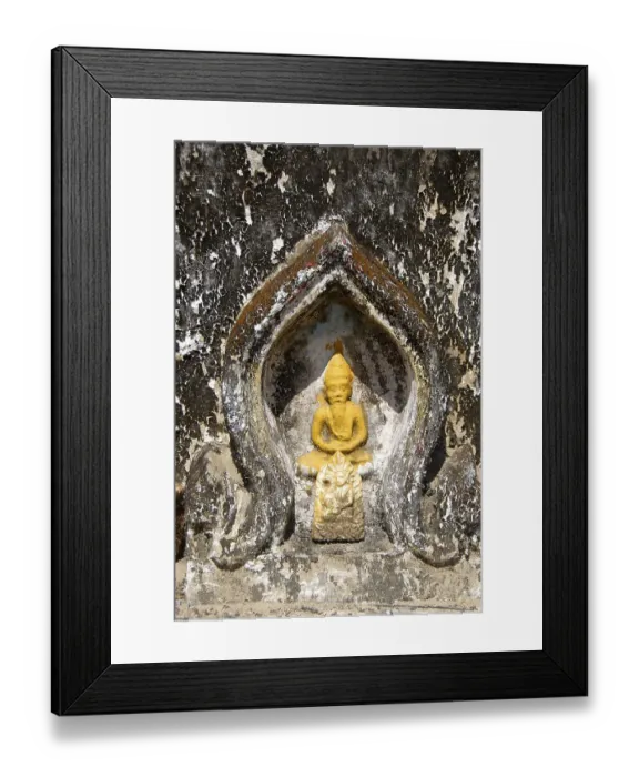 Framed Print : Theravada Buddhism, detail of yellow Buddha figure in meditation posture
