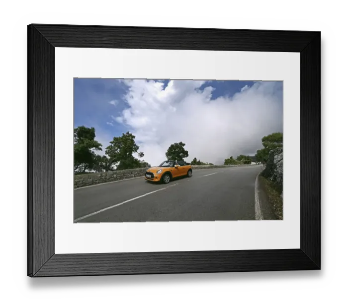 Framed Print : Mini Cooper Convertible on the Ma10 road in the Tramuntana Mountains Framed Print : Mini Cooper Convertible on the Ma10 road in the Tramuntana Mountains