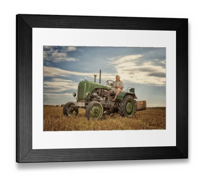 Framed Print : Man driving a Steyrer tractor, 15km / h