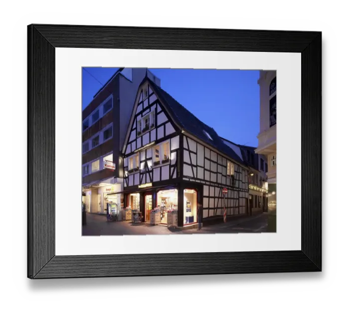 Framed Print : Commercial businesses in the historic town centre