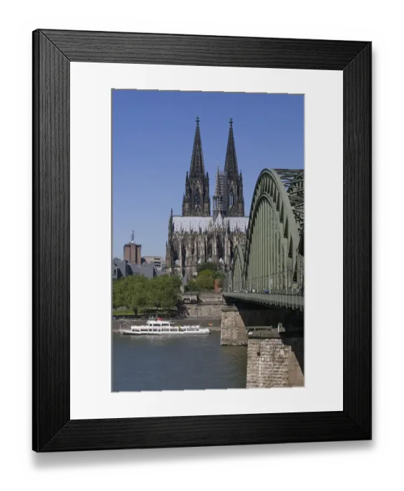 Framed Print : Cologne Cathedral, in front of the Hohenzollern Rhine bridge and a ship Framed Print : Cologne Cathedral, in front of the Hohenzollern Rhine bridge and a ship