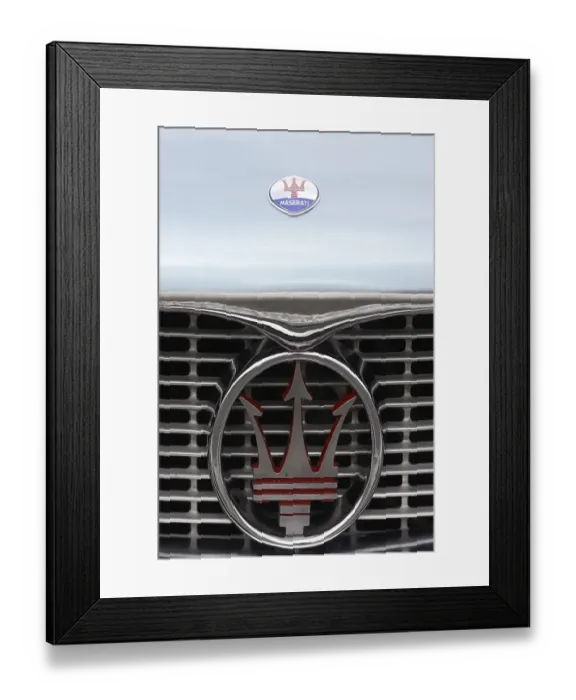 Framed Print : Radiator emblem of a Maserati