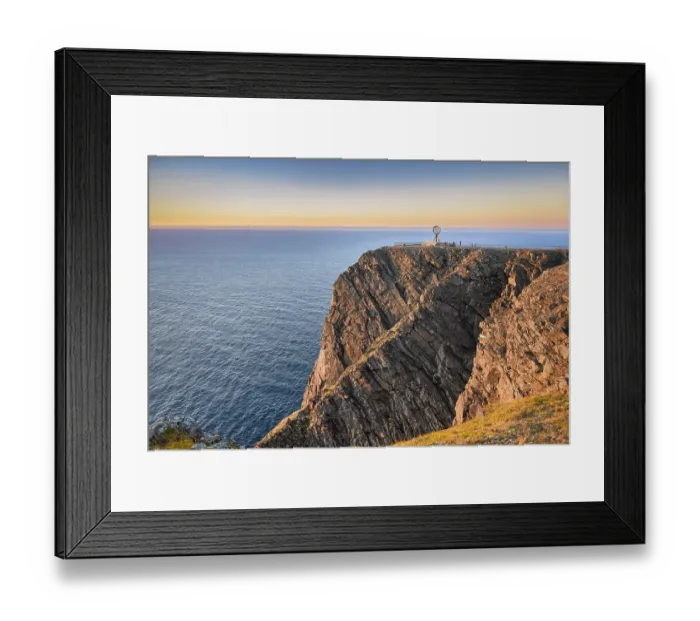 Framed Print : North Cape cliff with steel globe in the light of the midnight sun