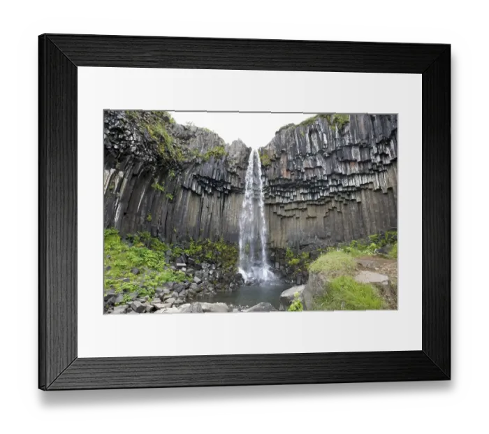Framed Print : Svartifoss waterfall, water rushing over rocks