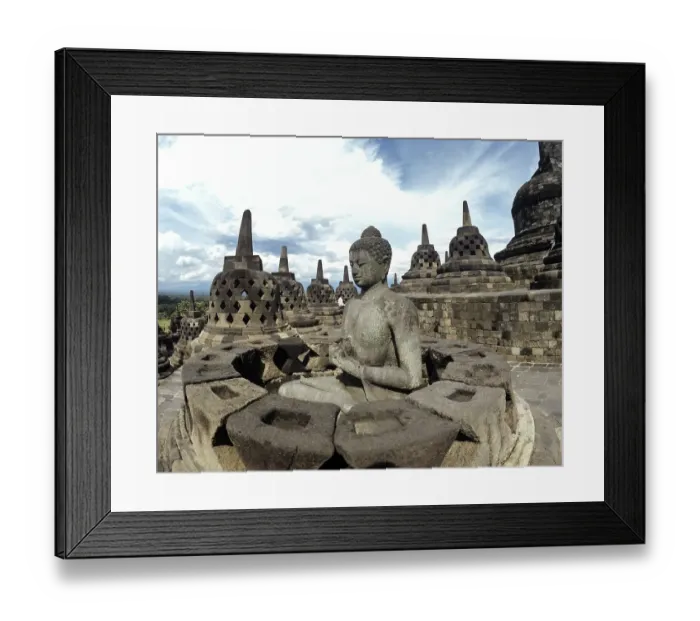 Framed Print : Exposed Buddha statue in the temple complex of Borobudur