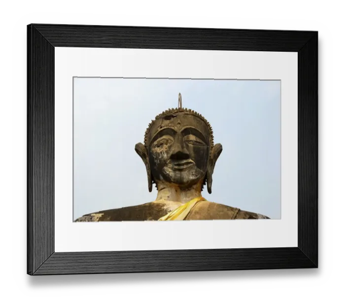 Framed Print : Battered buddha statue of the Wat Phia Wat Temple Framed Print : Battered buddha statue of the Wat Phia Wat Temple