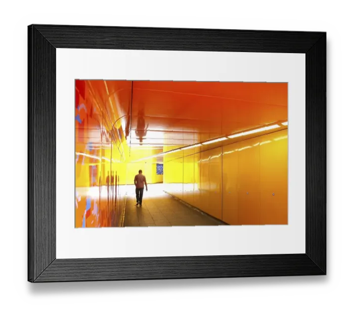 Framed Print : Man walking through an underpass in London Framed Print : Man walking through an underpass in London