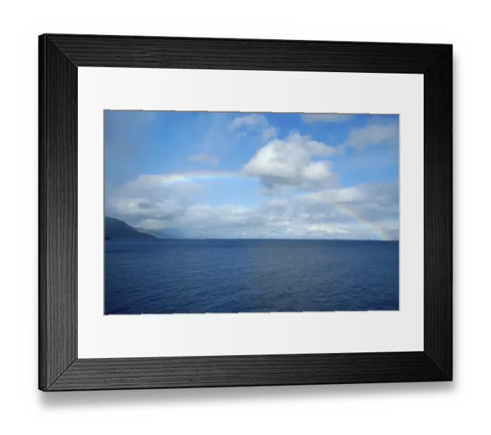 Framed Print : Rainbow and clouds over the sea Lofoten Norway