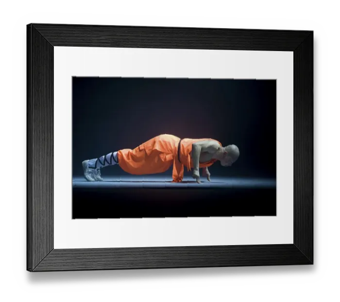 Framed Print : Pushup on two fingers, Shaolin monk during a show on the 22nd of March 2009 in Berlin