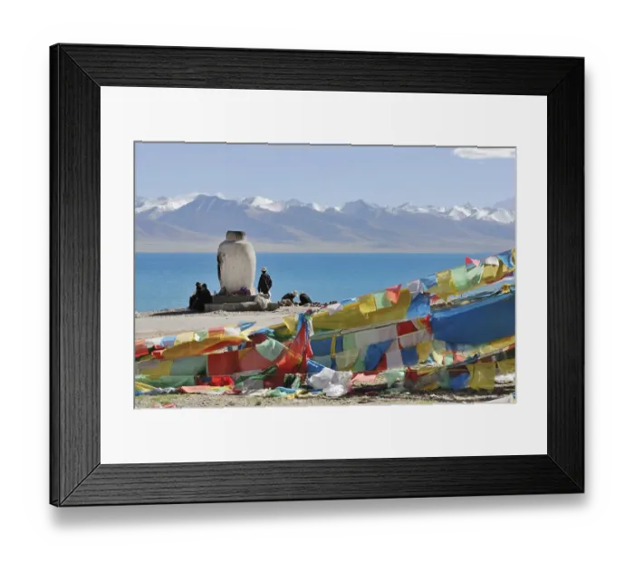 Framed Print : Tibetan pilgrims in front of the snow-covered peaks of the Nyenchen Thanglha Mountains Framed Print : Tibetan pilgrims in front of the snow-covered peaks of the Nyenchen Thanglha Mountains