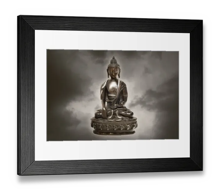 Framed Print : Tibetan Buddha statue made of bronze, with clouds Framed Print : Tibetan Buddha statue made of bronze, with clouds