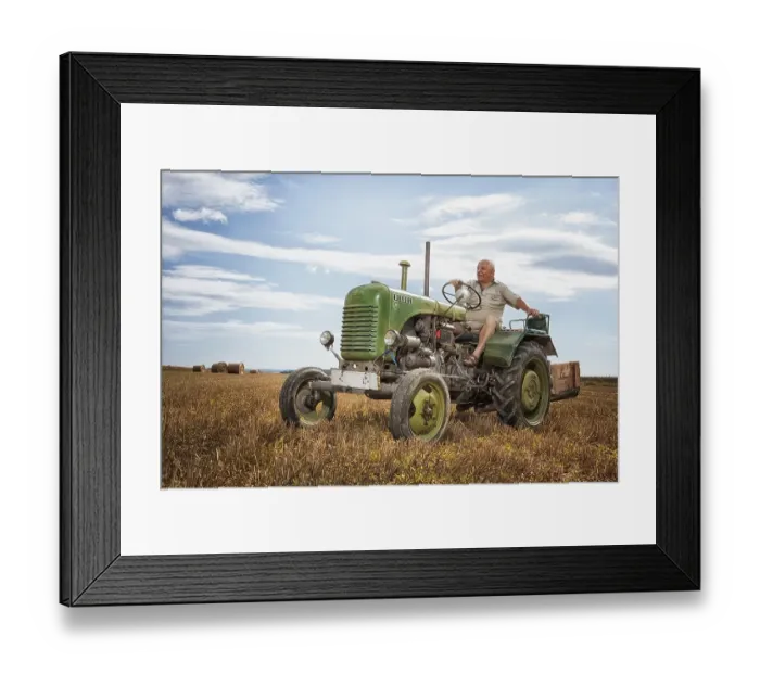 Framed Print : Man driving a Steyrer tractor, 15km / h Framed Print : Man driving a Steyrer tractor, 15km / h