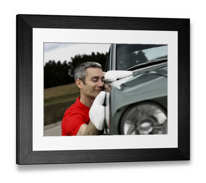 Framed Print : Man lovingly caring for his vintage car