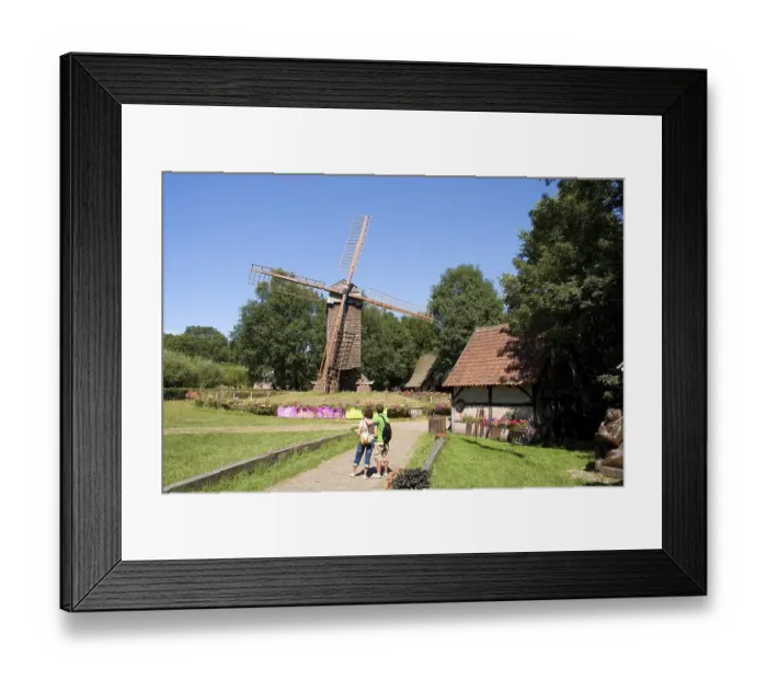Framed Print : Visitors in front of the Bockwindmuehle windmill at the Muehlenhof Open-Air Museum