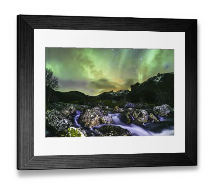 Framed Print : Aurora borealis over landscape with small river near the Sethaugelva lake in Tromvik