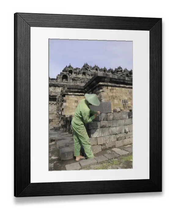 Framed Print : Man doing stonemasonry, restoration of the Borobudur temple