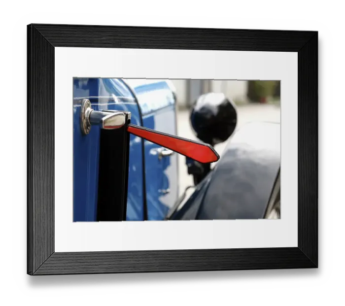 Framed Print : Indicator of a vintage car