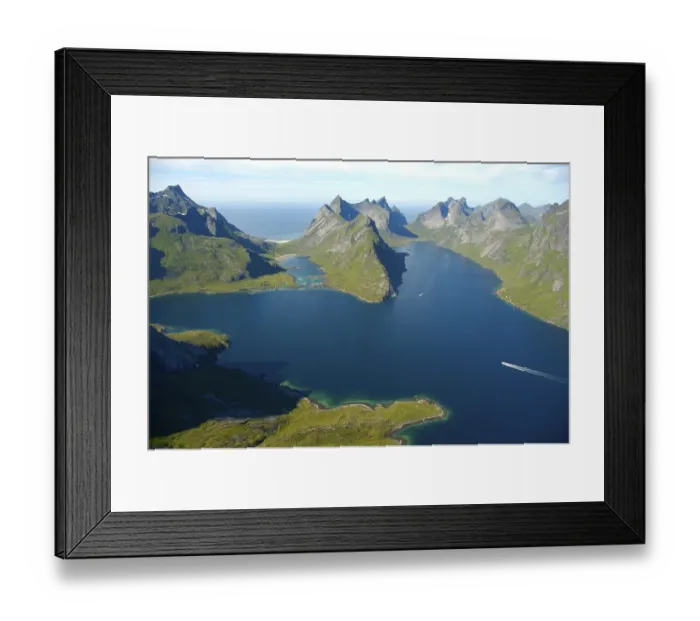 Framed Print : Rough mountains with fjord Kjerkfjorden and boat Moskenesoya Lofoten Norway