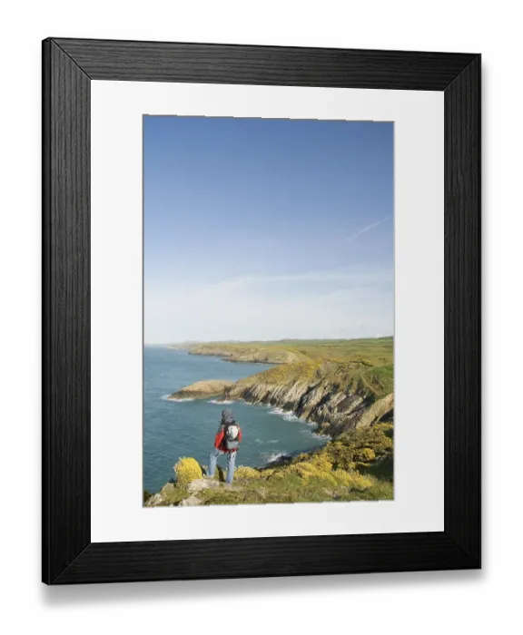 Framed Print : Hiker looking out over the coast Framed Print : Hiker looking out over the coast
