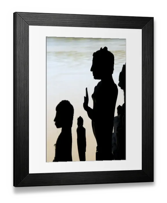 Framed Print : Silhouette of Buddha statues Pak Ou Cave near Luang Prabang Laos