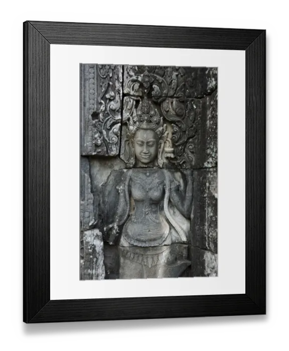 Framed Print : Stone carving of a female face