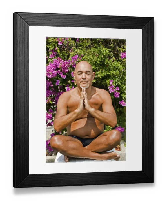 Framed Print : Meditating senior citizen