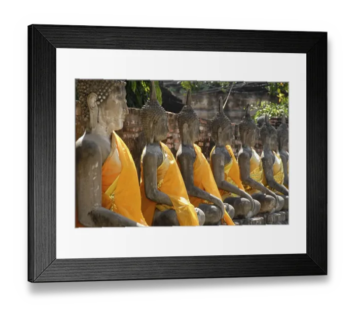 Framed Print : Many Buddha figures in a row with orange cloth Wat Yai Chai Mongkol Ayutthaya Thailand