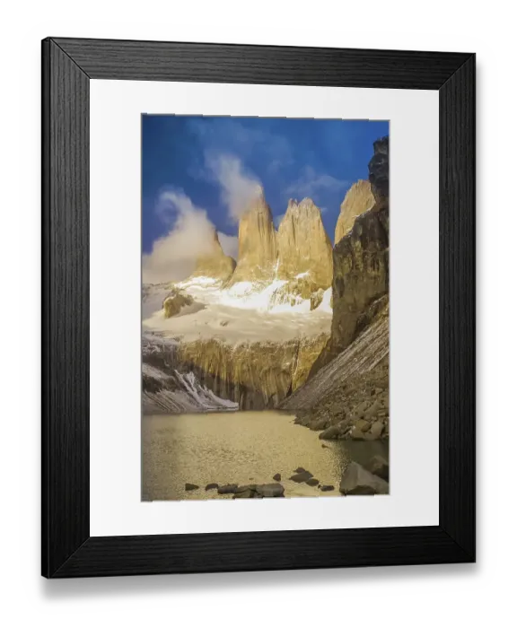 Framed Print : Photo of river and rocks covered in snow in Parque Nacional Torres del Paine in Chile
