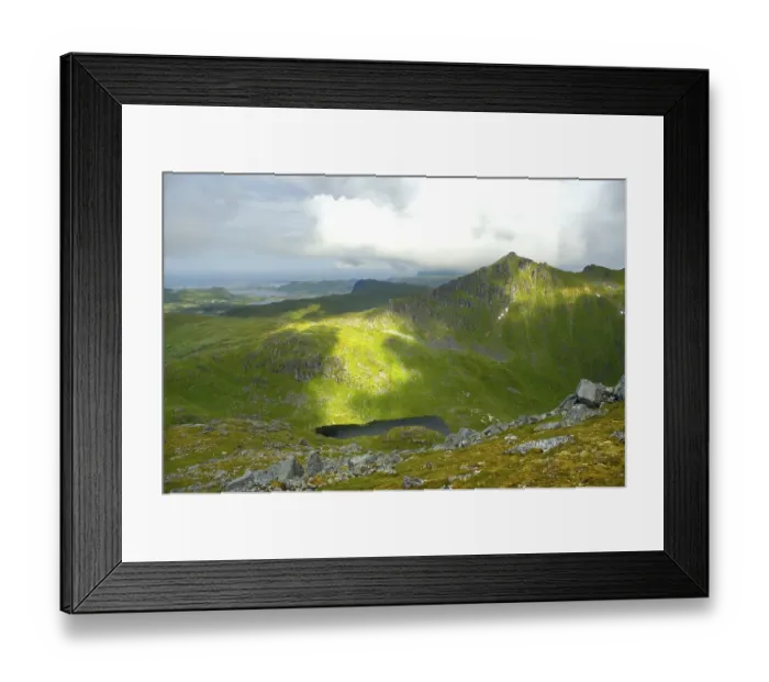 Framed Print : Spots of sun at mountains and lake Vestvagoya Lofoten Norway